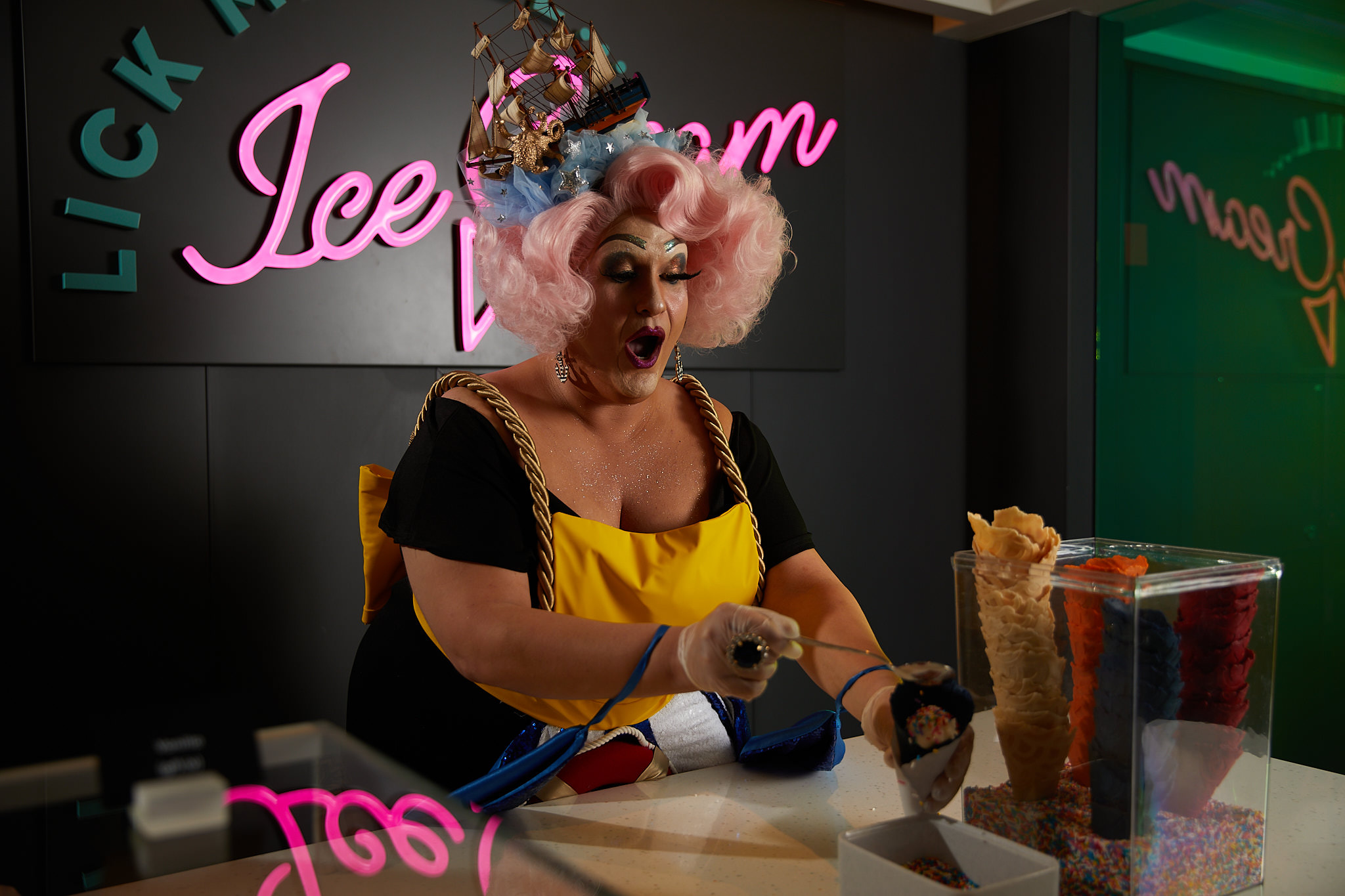 Drag queen serving ice cream
