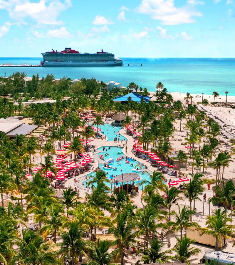 Beach club pools with ship in the distance