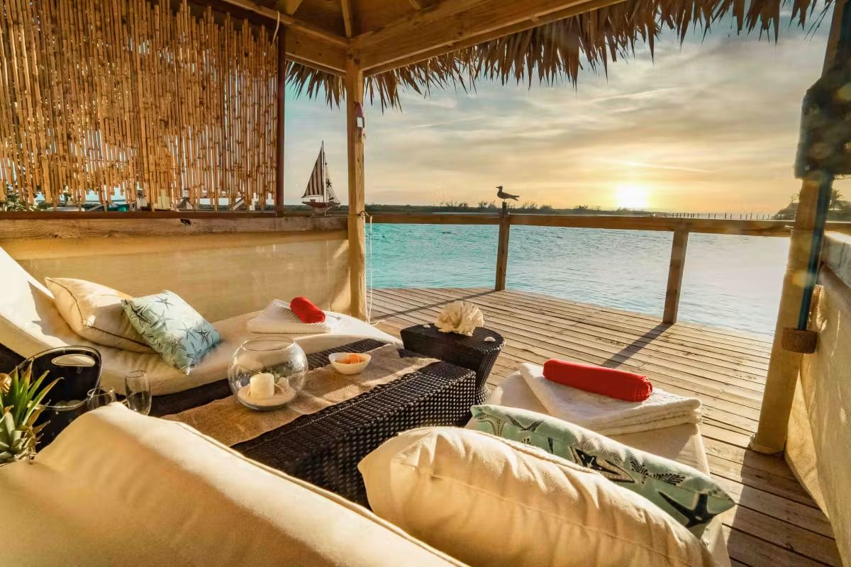 Overwater cabana at sunset